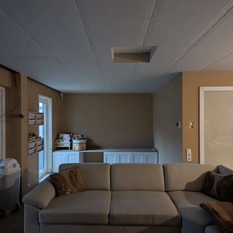Drywall ceiling in a living room during finishing